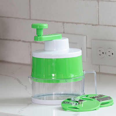 NORPRO<sup>&reg;</sup> Triple Spiral Slicer - Create healthy substitutes with fruits and vegetables when preparing your favorite meals. Features convenient, compact hand operated slicer, non-slip base, recipes, and 3 separate blades: ribbon, coily cut, and noodle.