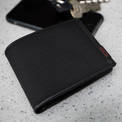 TUMI<sup>&reg;</sup> Global Center Flip ID Passcase - From the Tumi<sup>&reg;</sup> Alpha collection, this passcase is constructed from Tumi's signature ballistic nylon with leather trim and interior. Inside passcase features ID window, eight card slots and is 4.12"H x 3.5"W.